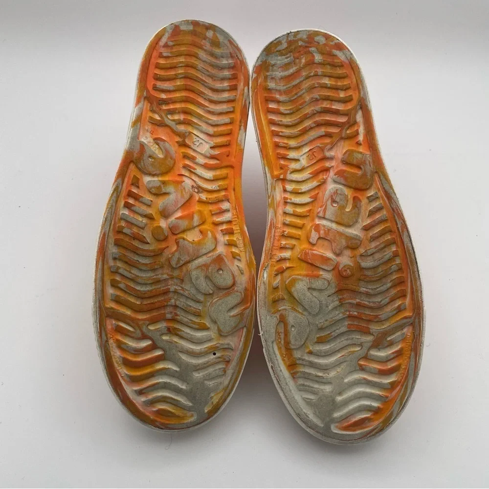 Native orange swirl slip on size 2 water shoes